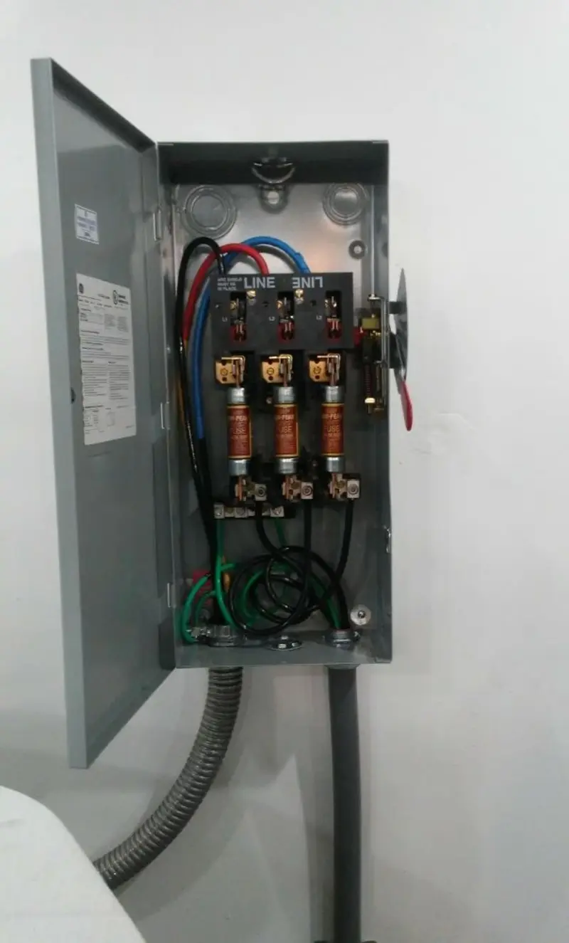 Three-phase disconnect switch installed for Smoke Detector Installation in Howland Center